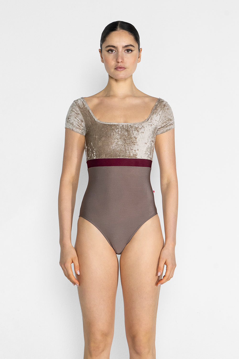 Marieke Variation 1 leotard in N-Star body color with CV-Toffee top & trim color and N-Burgundy middle band color. CV-Toffee short sleeves