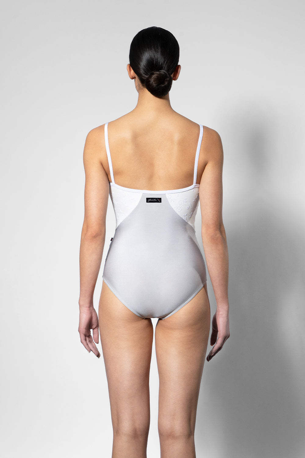 Amanda Black Label leotard in N-Silver body color with Sparkling Ivory top and V-White trim color