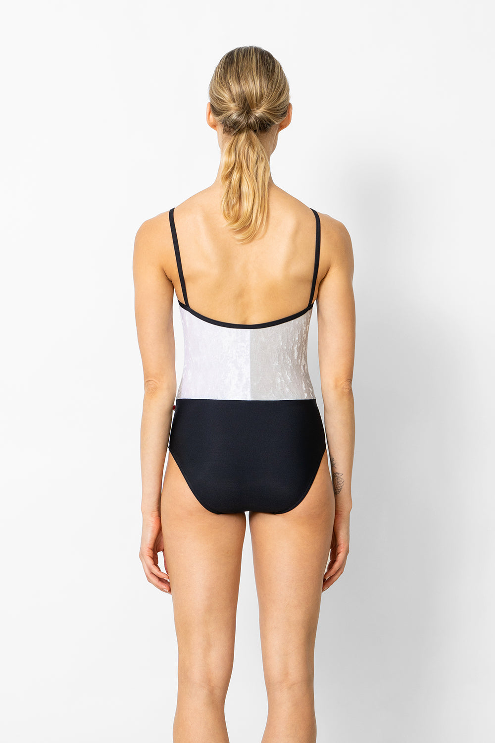 Kayoko leotard in N-Black body color with CV-Silver top right color, CV-White top left color and N-Black trim color