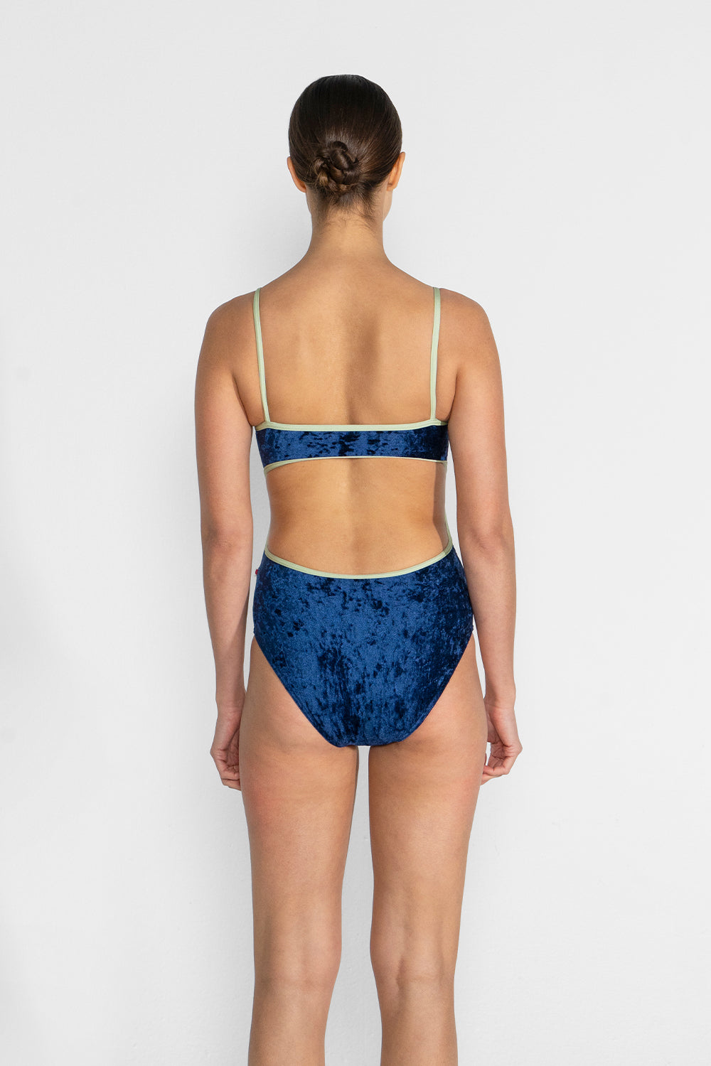 Kiki leotard in CV-Dark Blue body color with T-Pistachio trim color