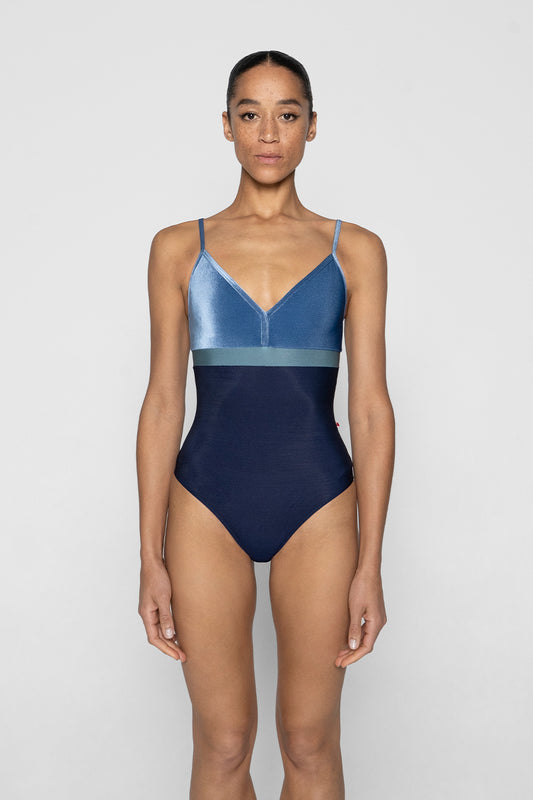 Zoe leotard in N-Dark Blue body color with V-Ocean top & trim color and N-Frost middle band color