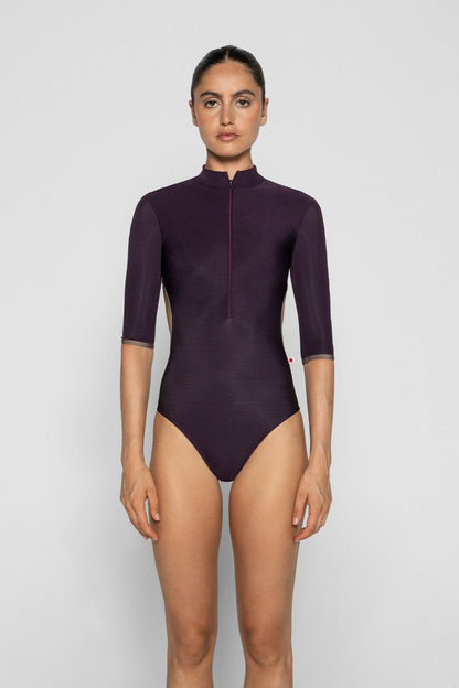 Charlotte leotard in N-Eggplant body color with N-Star trim color and half sleeves