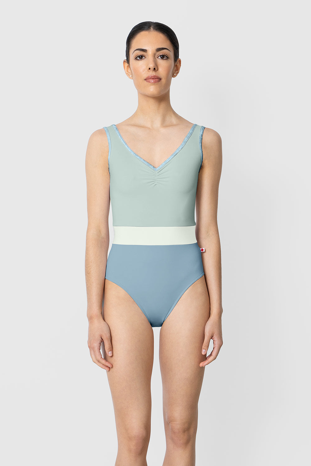 Lucy leotard in T-Fog body color with T-Whisper top color, CV-Ice trim color and T-Pistachio middle band color