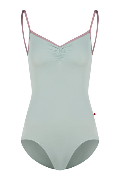 Kiki leotard, pale sage-green with a ruched V-neck and dusty-pink strap trim.