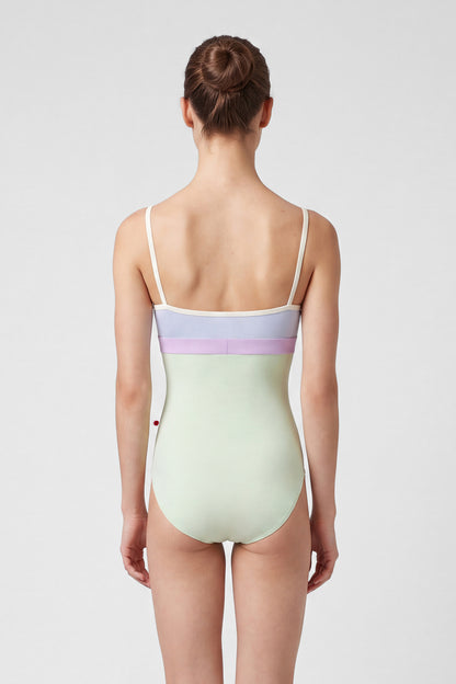 AI-generated model. Zoe leotard, lilac velvet V-neck bodice with a pistachio body and lilac waistband, thin cream straps.