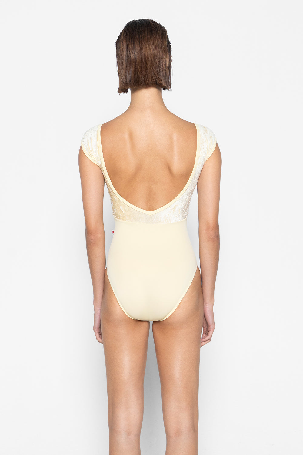 Elli leotard in T-Vanilla body color with CV-Vanilla top color and T-Vanilla trim color
