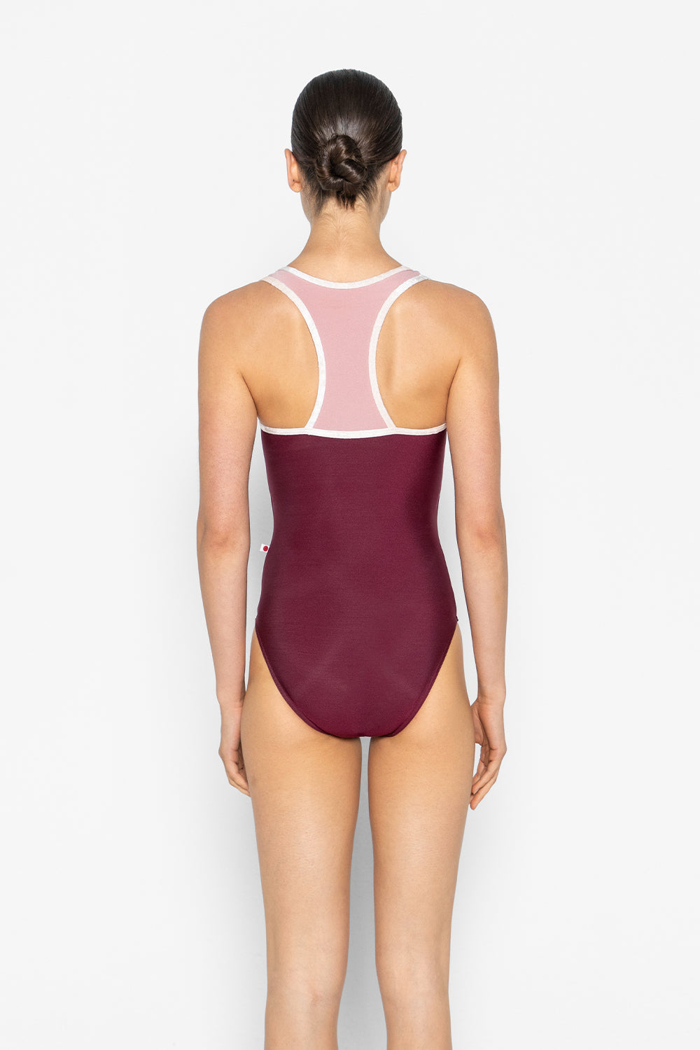 Erica leotard in N-Burgundy body color with N-Antique Rose top color and CV-Misty Rose trim color