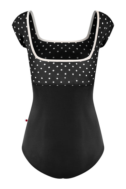 Marieke leotard, black T-Lunares polka-dot square-neck bodice with cream trim and black body, cap sleeves.