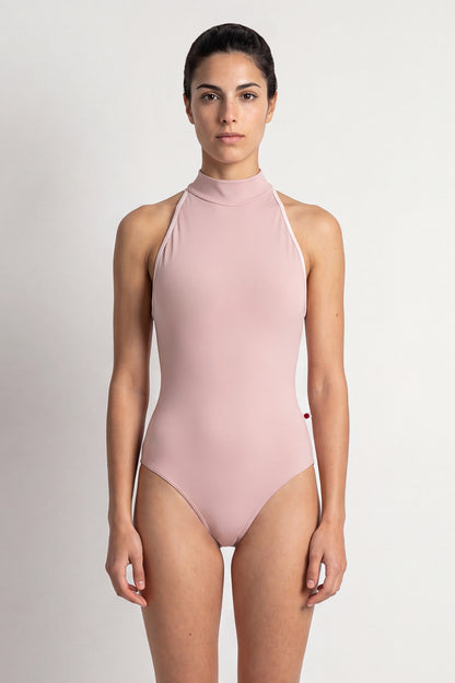 AI-generated model. Noe leotard, dusty-rose with a high halter neck and open sides.