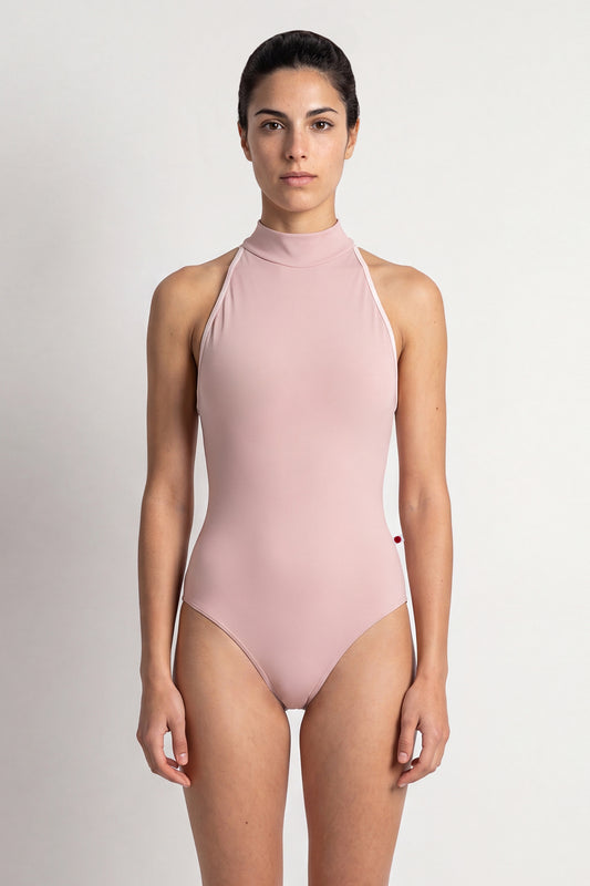 AI-generated model. Noe leotard, dusty-rose with a high halter neck and open sides.