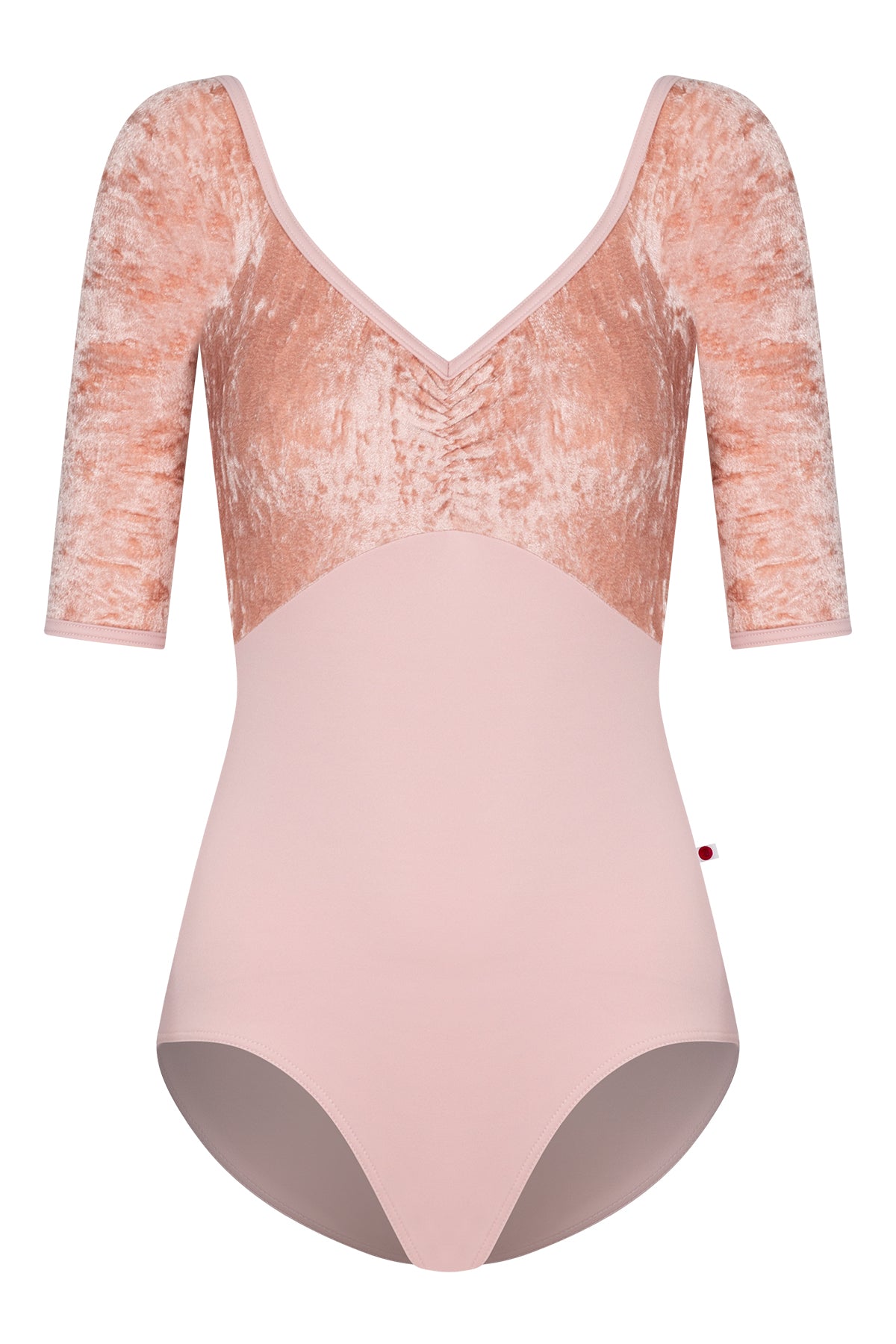 Elli leotard, blush-pink with a crushed-velvet elbow-sleeve bodice and gathered V-neck.