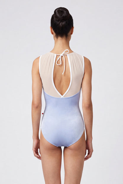AI-generated model. Paris leotard in Serenade, pale periwinkle velvet with a white gathered mesh boat neckline. 
