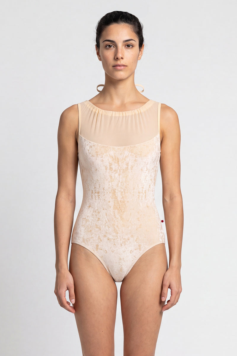 AI-generated model. Paris leotard in Vanilla, vanilla velvet with a gathered mesh boat neckline. 