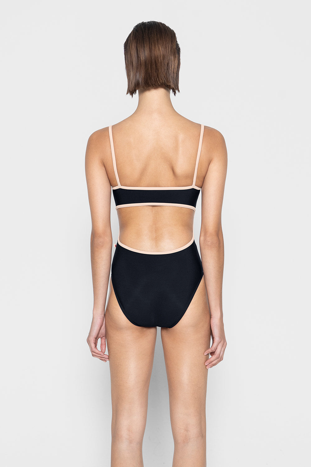 Kiki leotard in N-Black body color with CV-Misty Rose trim color