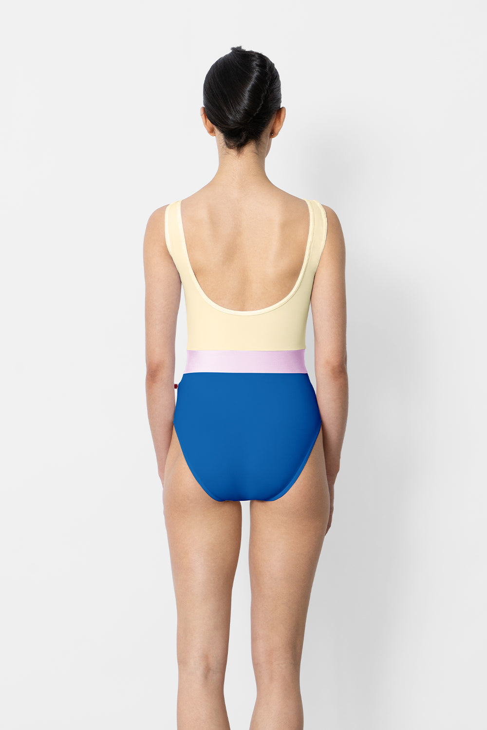 Lucy leotard in T-Lapis body color with T-Vanilla top color, CV-Vanilla trim color and T-Rose middle band color