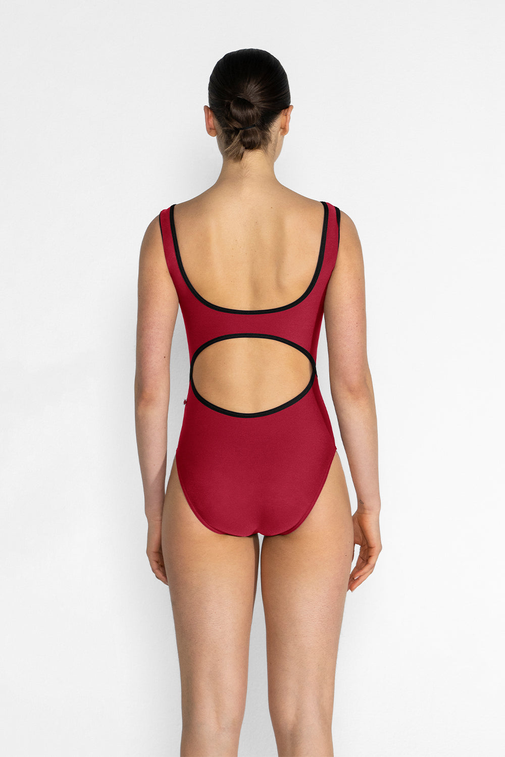 Veronique leotard in N-Berry body color with T-Black trim color