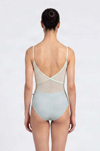 AI-generated model. Fiona leotard, pale pistachio with a scoop neck and thin pale-yellow straps.