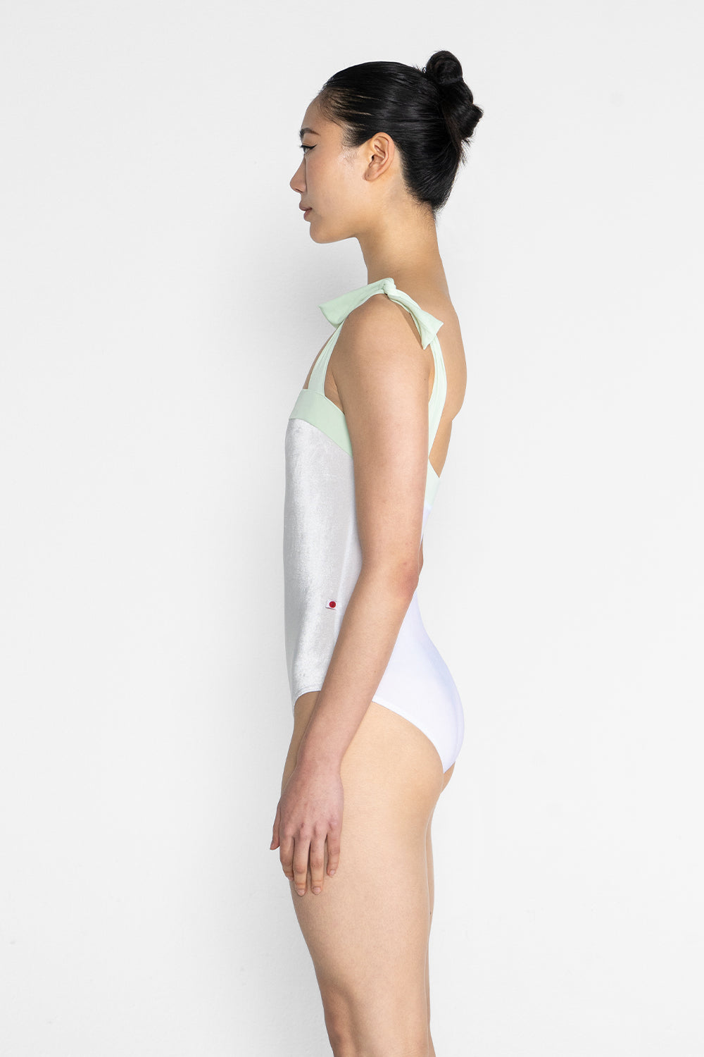 Mimi leotard in V-White body color with T-Pistachio top color